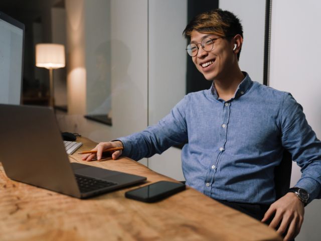 Happy Asian Guy Virtual Assistant Outsourcing Work From Home Remote Customer Services IT Support WFH