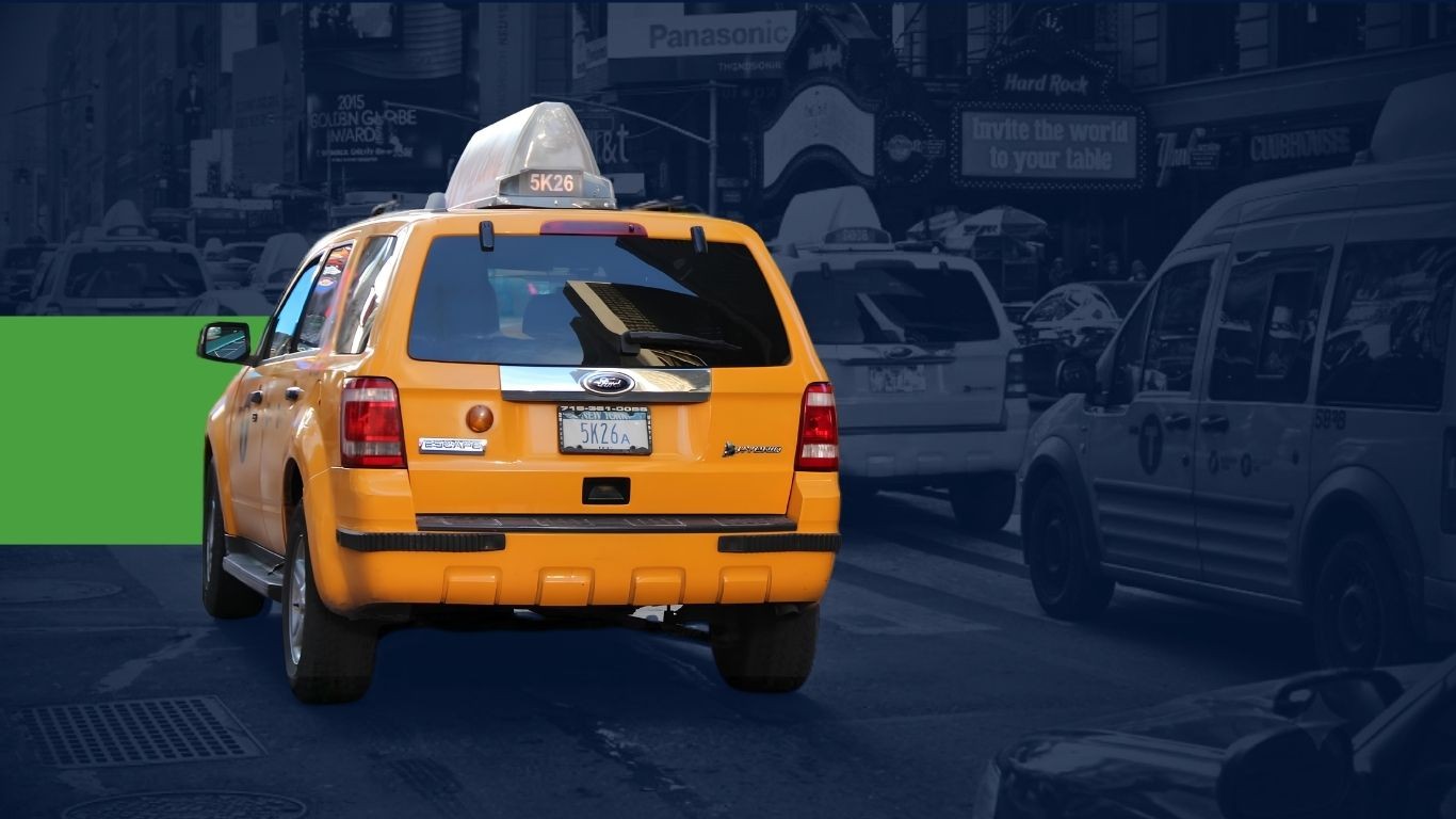 Taxi driving through the city