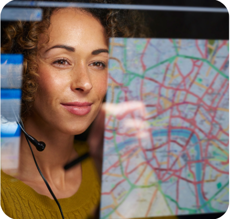 NEMT Dispatcher Coordinating Routes on Map